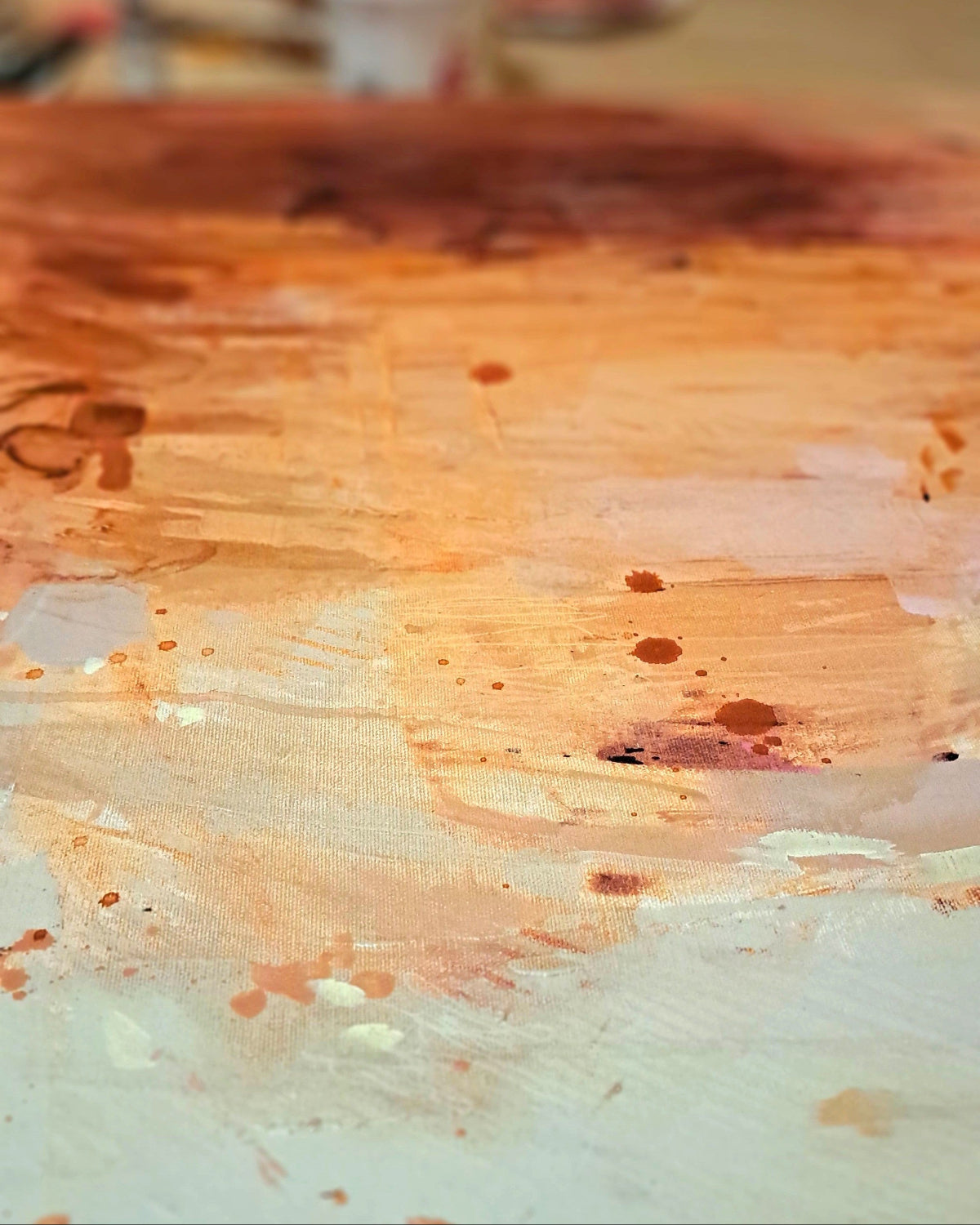 Close-up of acrylic painting with visible grain and texture