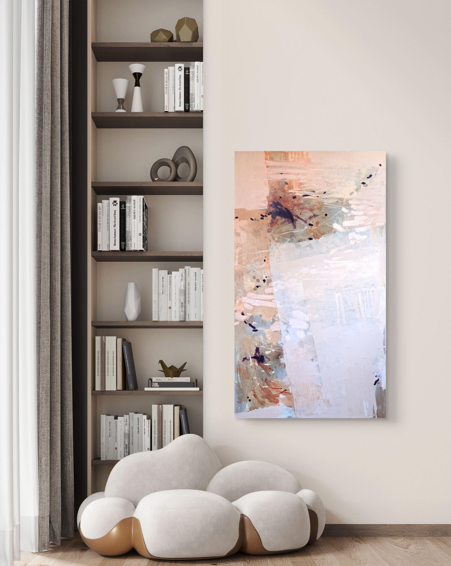 Abstract painting on a wall next to a bookshelf with decorative items