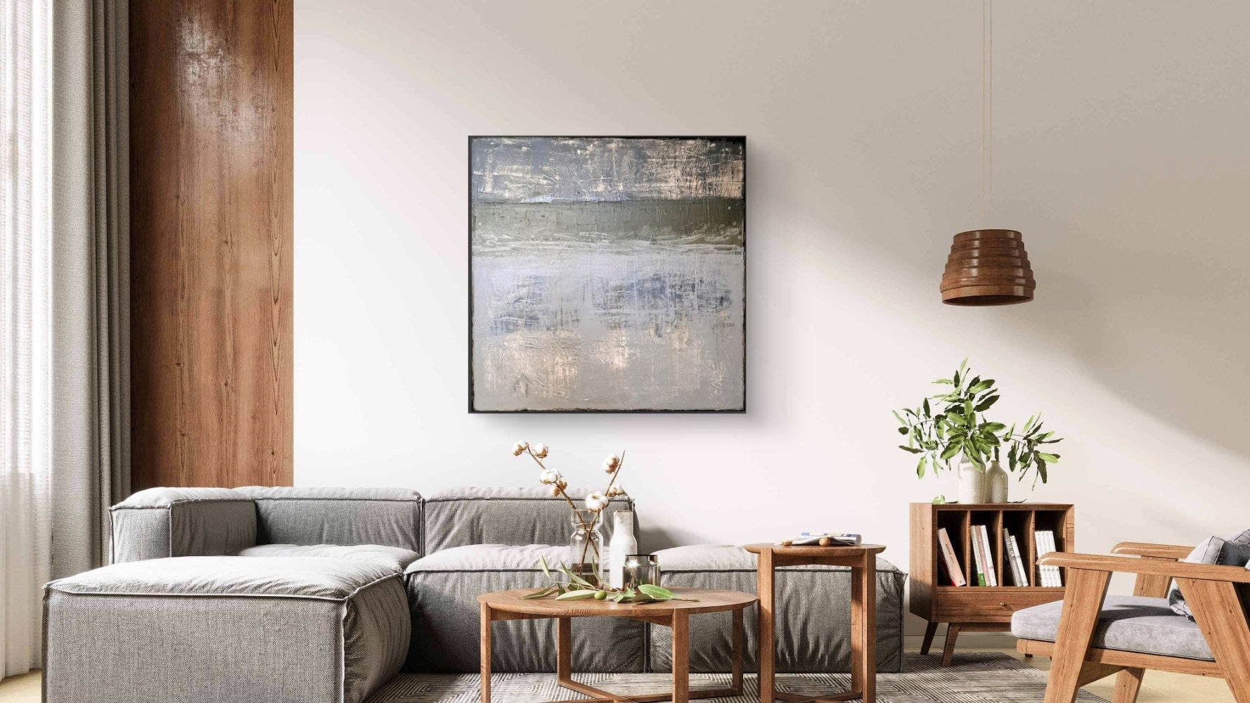 Modern living room with gray sectional sofa, wooden coffee table, and abstract painting on wall.