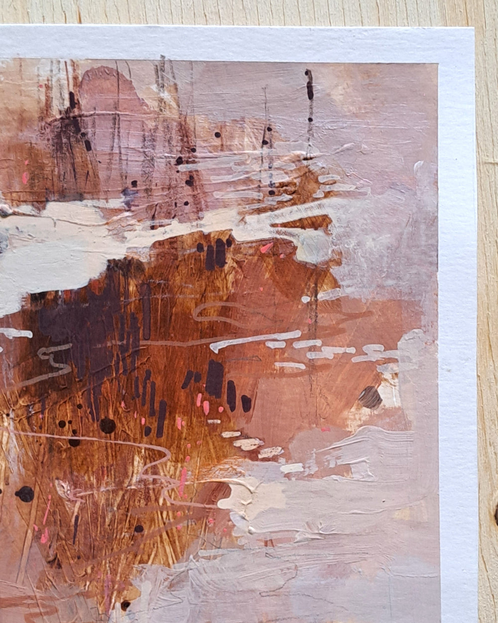 Abstract painting on a wooden surface